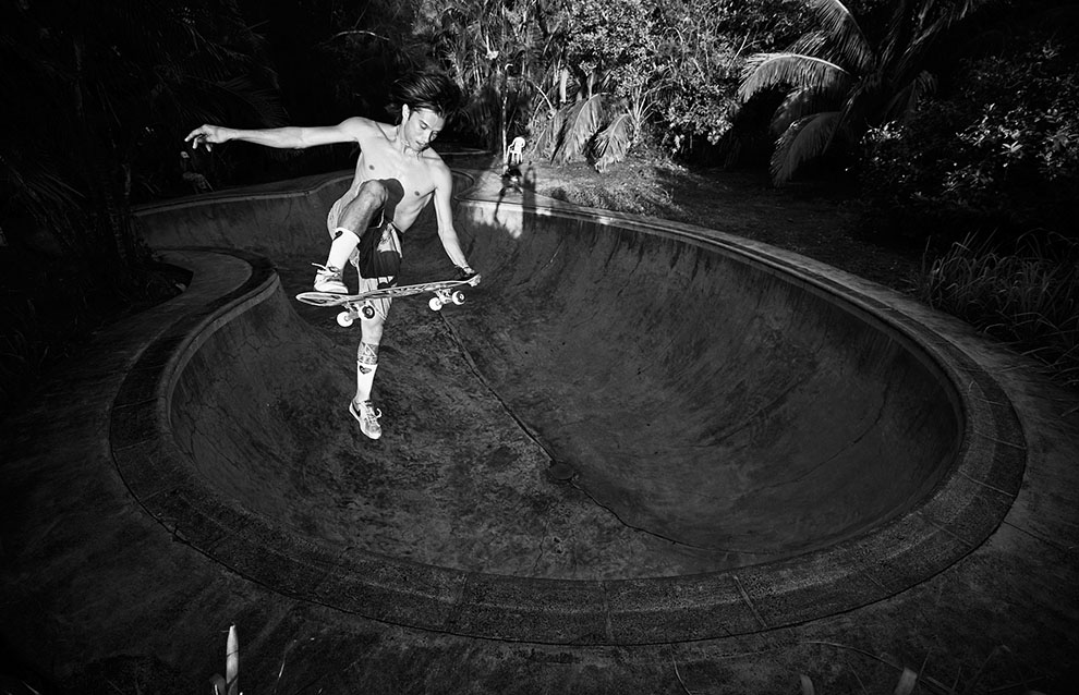 a person on a skateboard performing a trick in the air