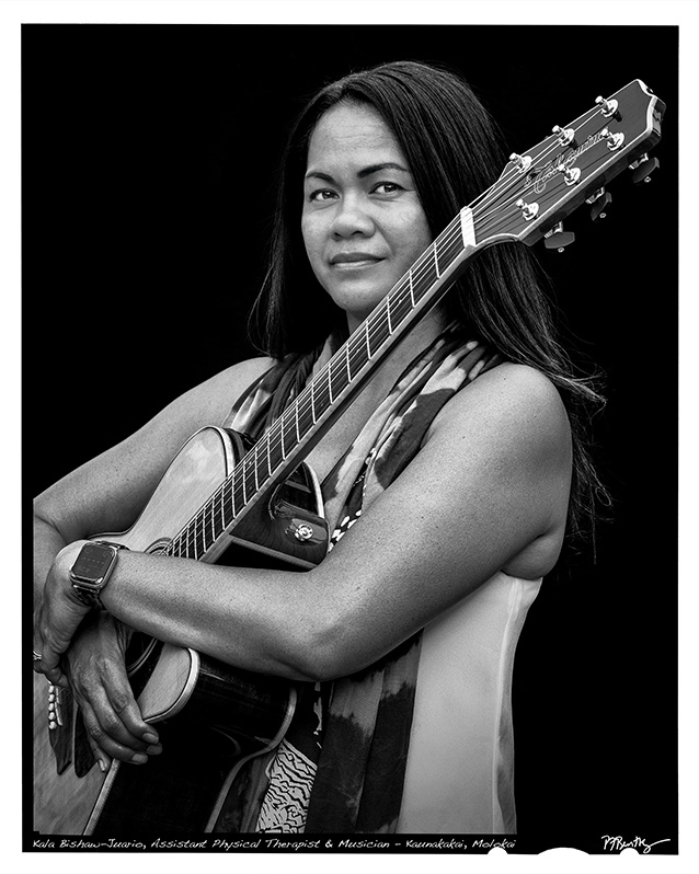a person holding a guitar