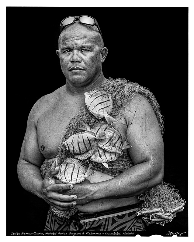 a person with a fish on his chest