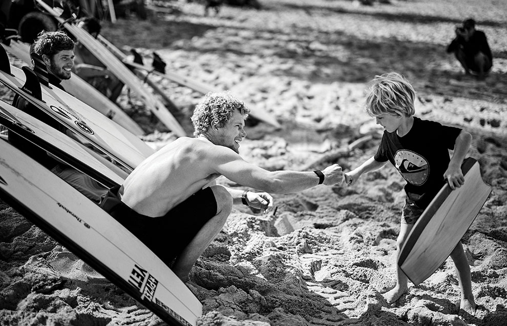 a person and child on a beach