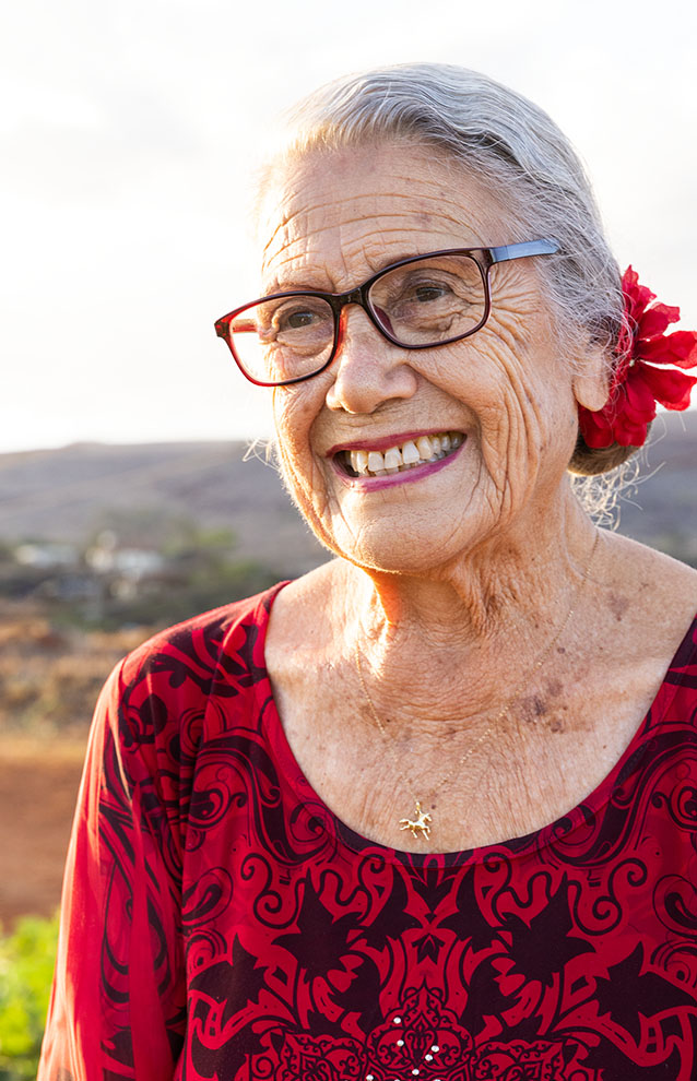a person with a flower in her hair
