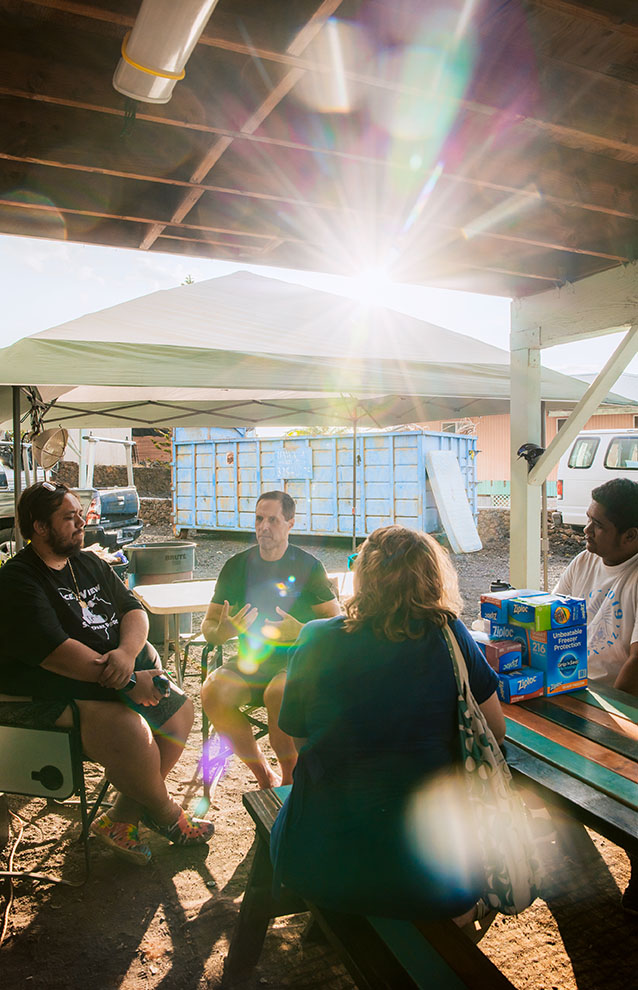 a group of people sitting at a table