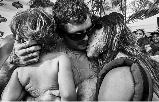 a person and person kissing a child