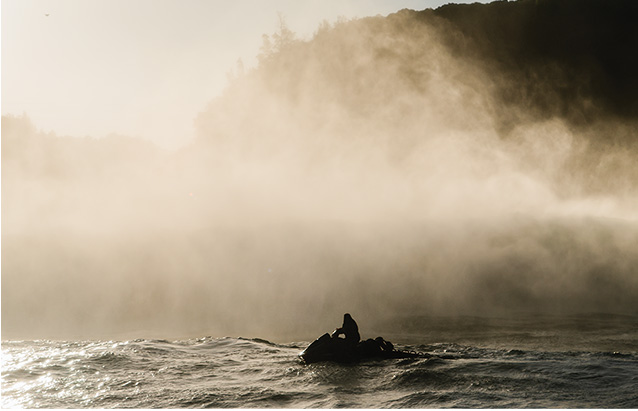 a person on a jet ski in the water