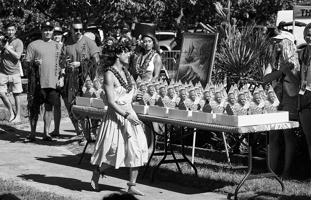 a person walking next to a table with persony small objects