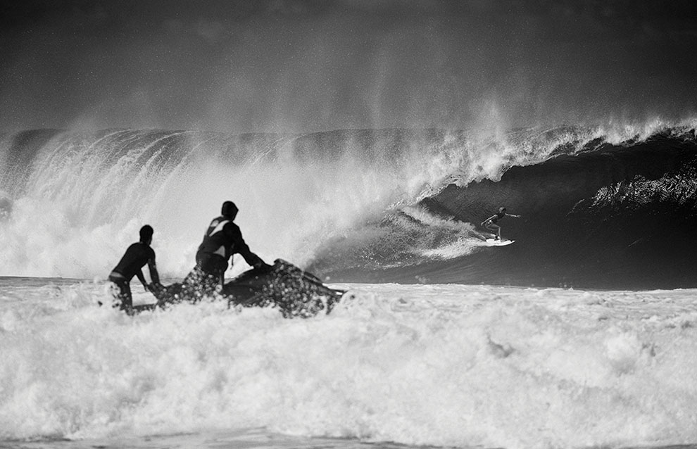a surfers riding a wave