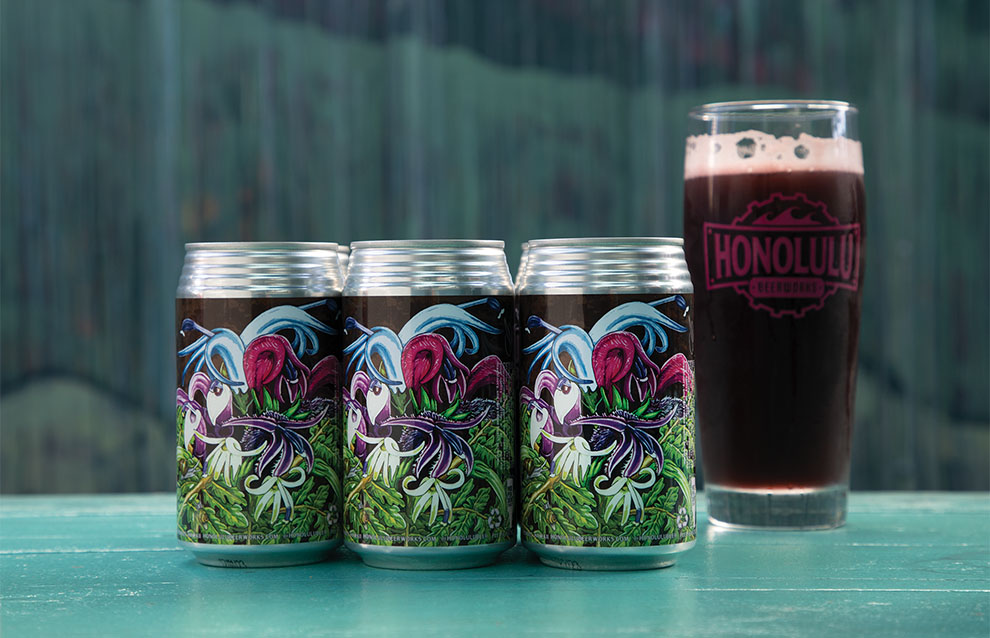 cans of beer next to a glass of liquid