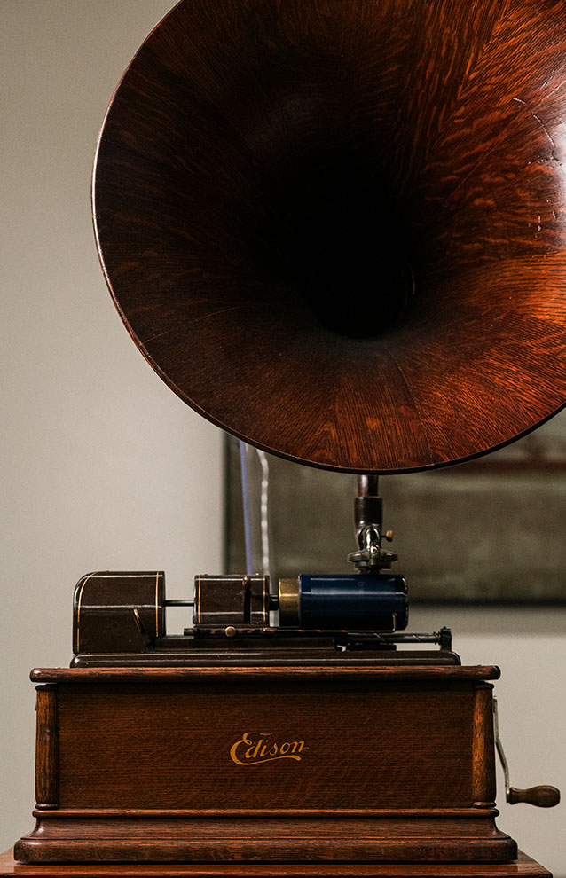 photo of a vintage phonograph in black walnut wood