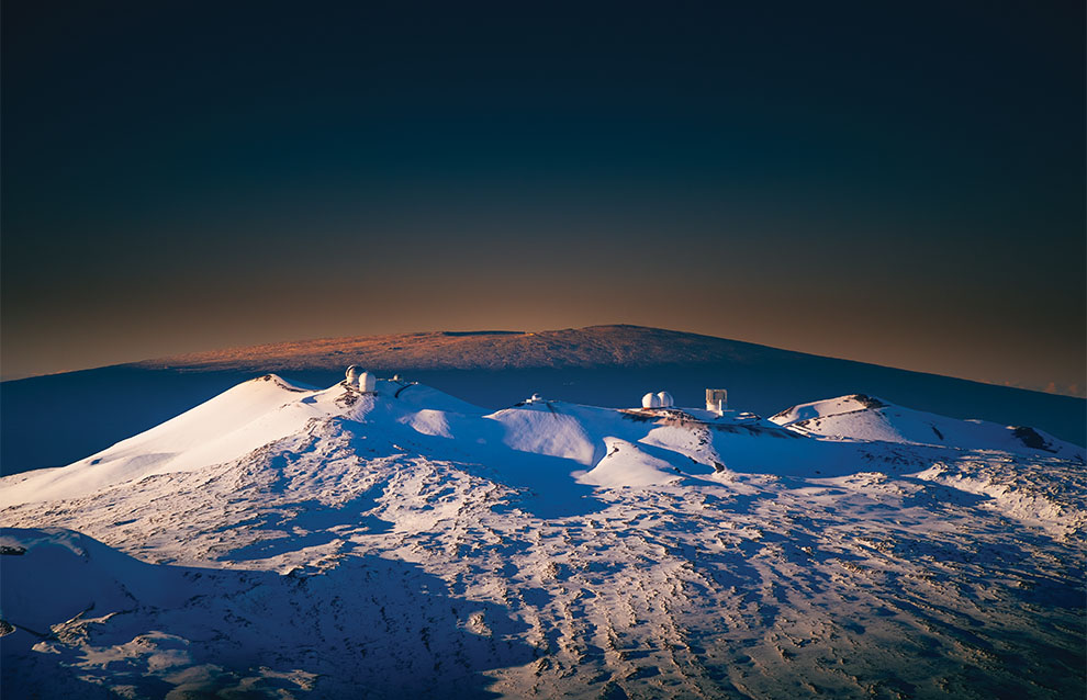 wide shot of a snowy landscape with weather machine stations