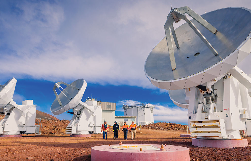 wide shot of a deserted landscape with weather machine stations