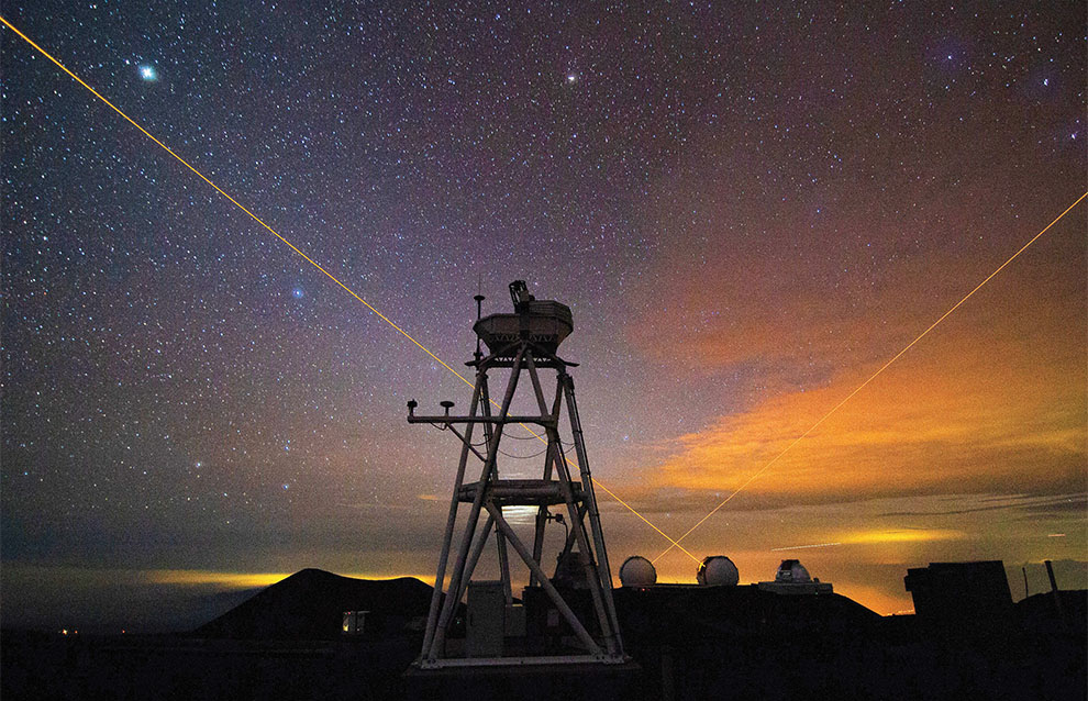 wide shot of the night sky with a weather machine in the middle