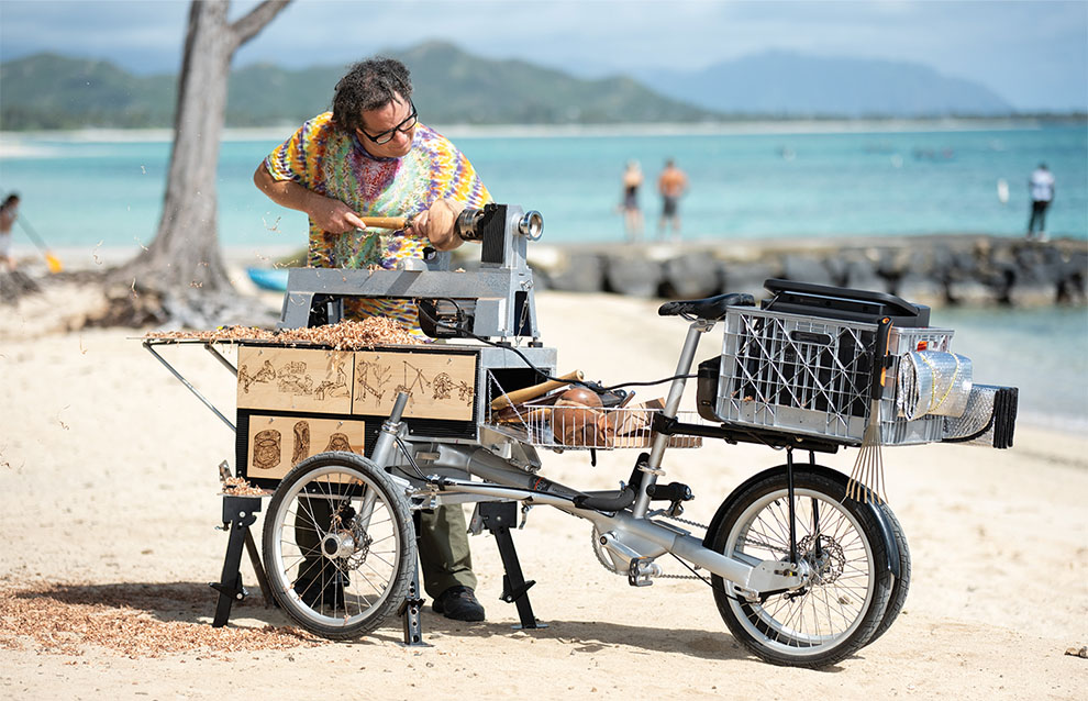 a person tending to a bicycle with baskets