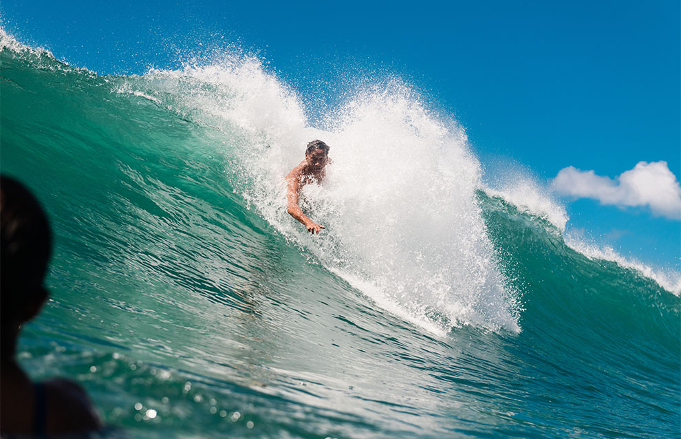 a person riding a wave