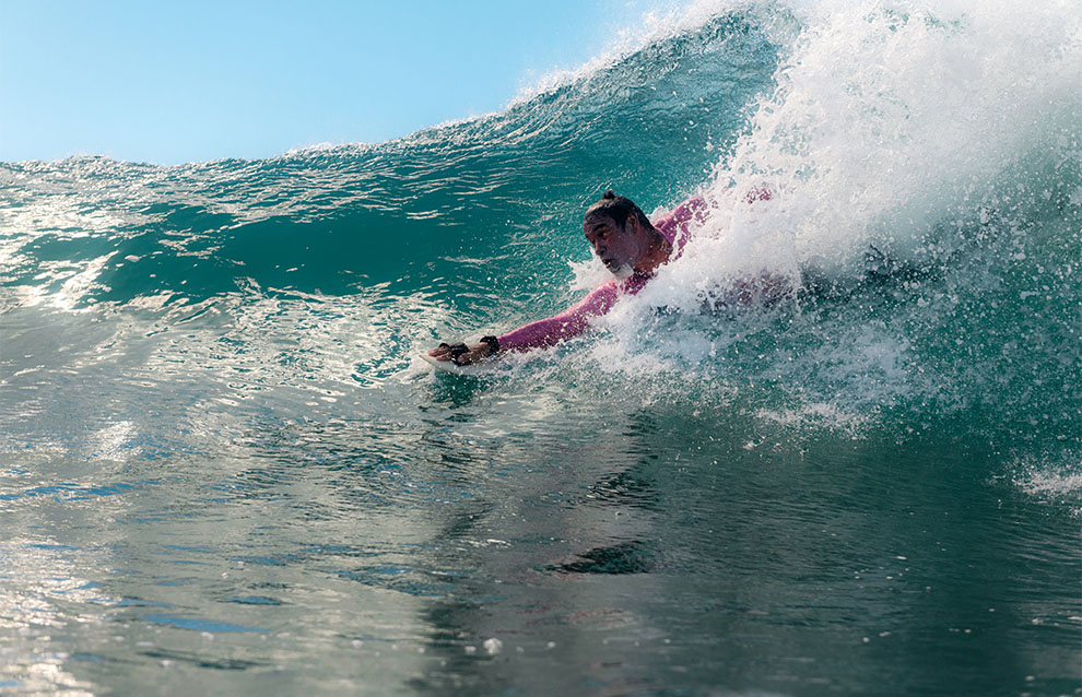 a person riding a wave