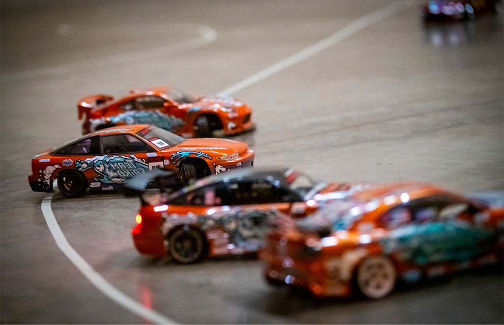 a line of remote control cars