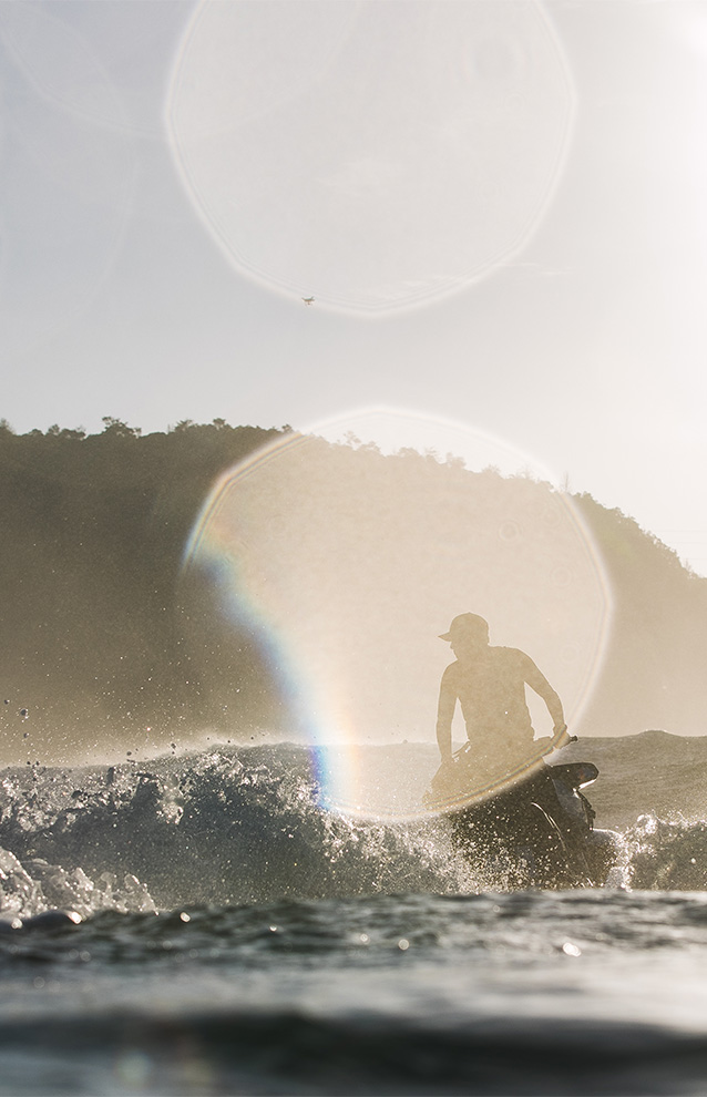 a person riding a jetski in the ocean